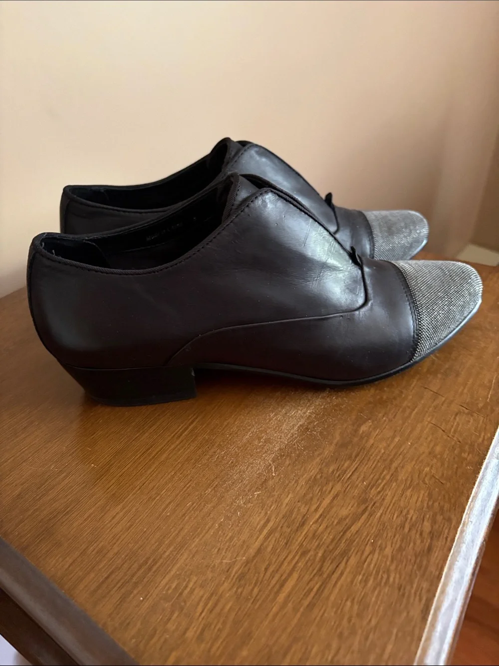 Women’s Dolce vita slip on with black leather and silver toe